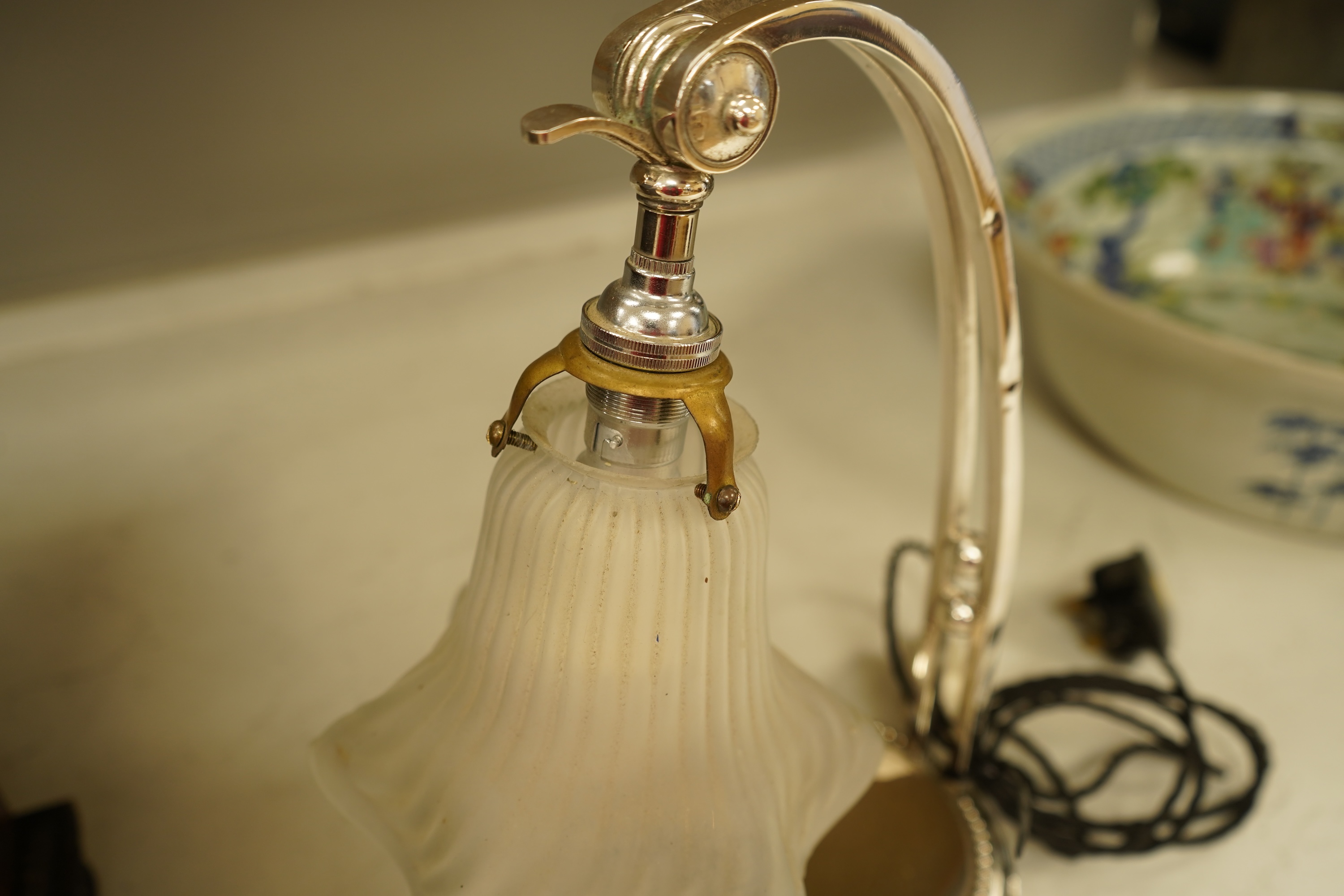 A plated adjustable desk light with opaque glass fluted shade, 35cm high